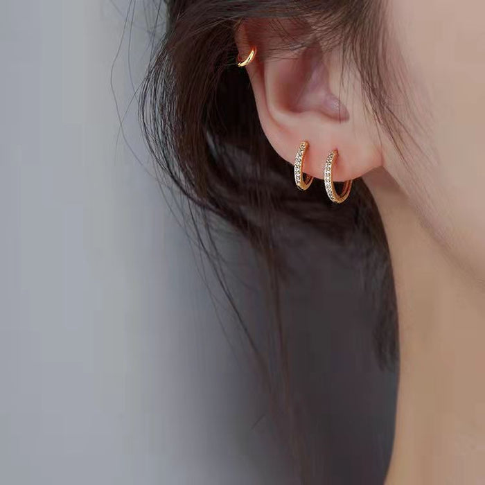 Wholesale Versatile silver plated sparkling diamond earrings with simple circular ear loops, exuding a sweet and feminine charm