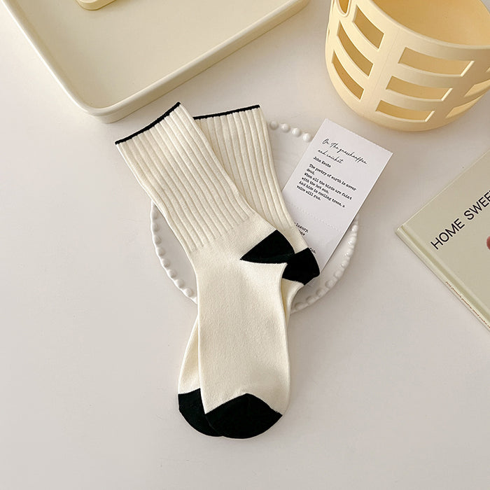 Wholesale Simple and versatile mid tube socks with trendy vertical stripes for slimming, sporty long tube pile socks