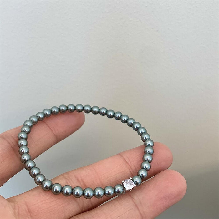 Wholesale pearl simple commuter flash bracelet easy to wear elastic bracelet female