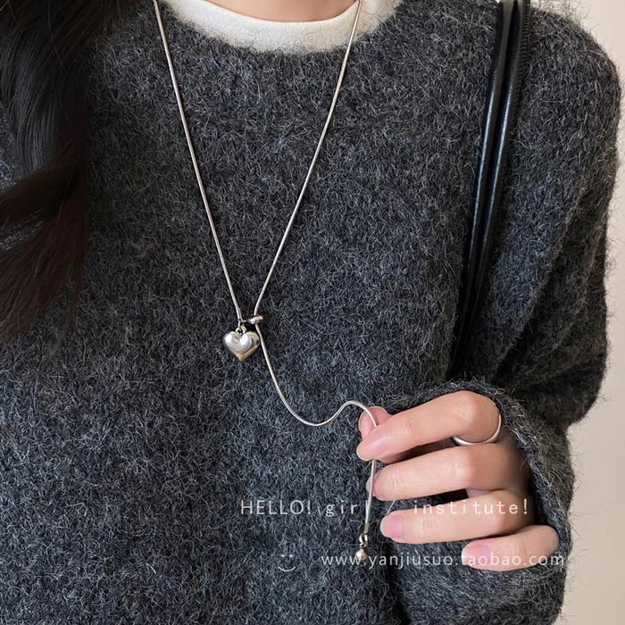 Wholesale Minimalist silver heart pendant necklace, women's light luxury high-end feel, long sweater chain accessory