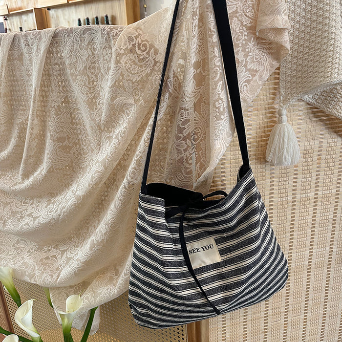 Wholesale Canvas striped large capacity fashionable simple versatile crossbody bag for work commuting tote bag