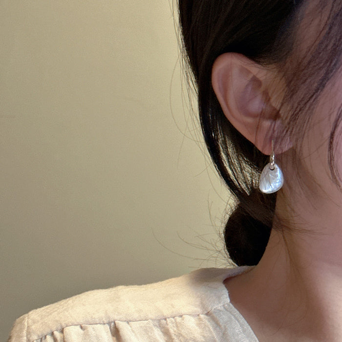Wholesale Sterling silver niche design, irregular white shell earrings, fashionable texture, ear accessories