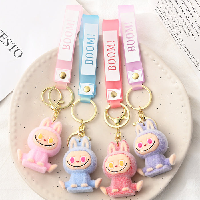 Wholesale Flocking Yoga Little Monster Keychain Small Pendant Cartoon Cute Doll Keychain Small Gift