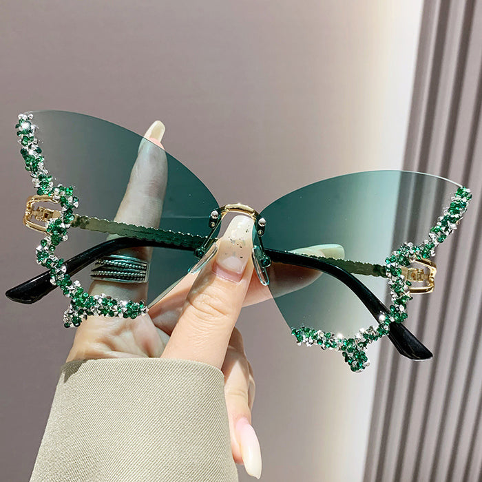 Wholesale New butterfly studded diamond rimless sunglasses with fashionable and exaggerated personality