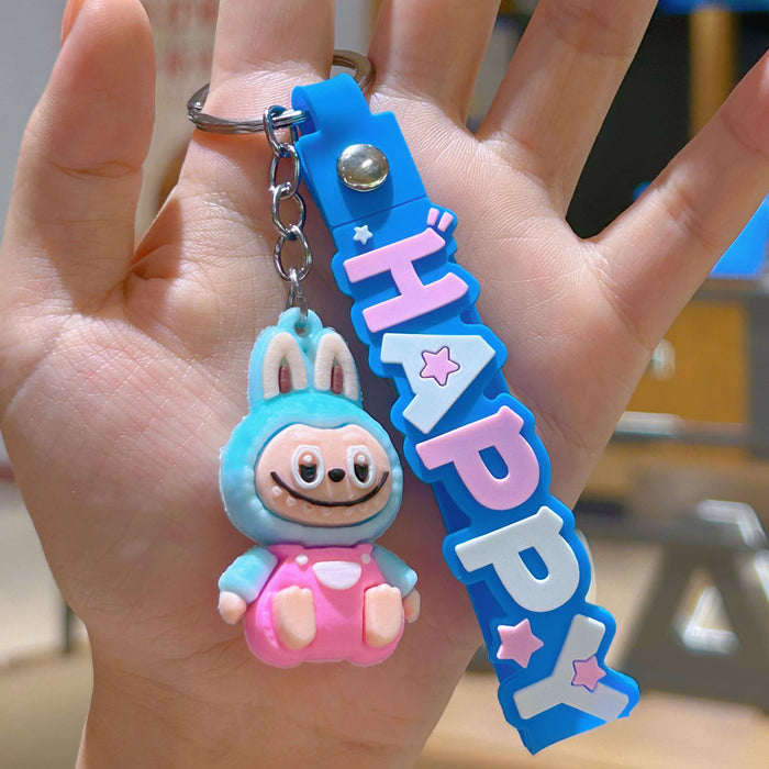 Wholesale Cute cartoon silicone keychain with cute little monster keychain for sweatshirt