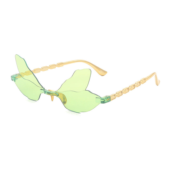 Wholesale Dragonfly shaped frameless sunglasses, personalized, penetrating, funny, decorative sunglasses