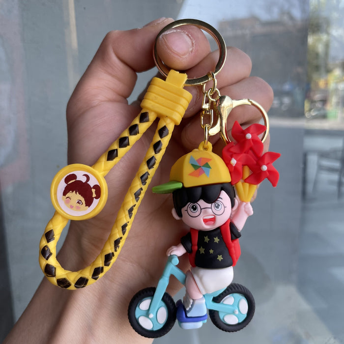 Wholesale Windmill couple keychain cute doll car keychain student backpack pendant couple small gift wholesale