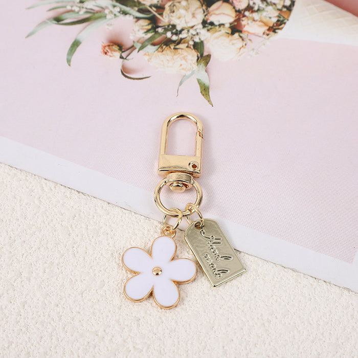 Wholesale Metal Multi-color Flower Keychain Bluetooth Headset Protective Case Accessories