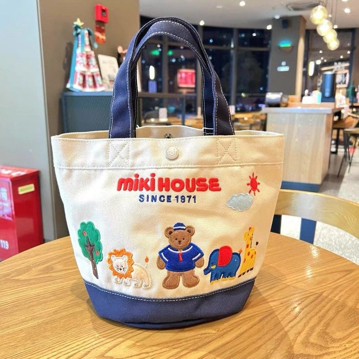 Wholesale canvas bag cartoon letter handbag mummy bag slip baby bag embroidered mother and baby bag