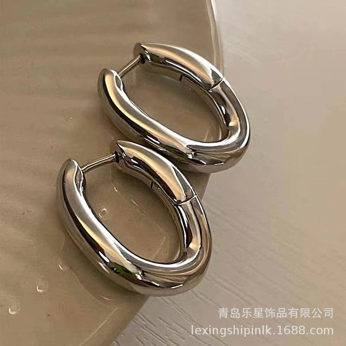Wholesale Simplicity, individuality, versatility, fashion, oval ring, curved ear buckle, women's niche design, elegant and versatile