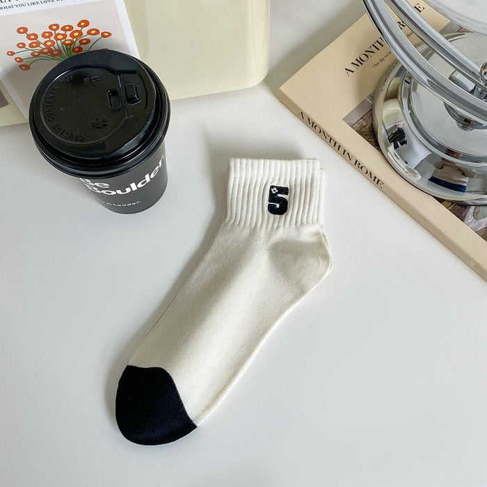 Wholesale Embroidered socks and socks