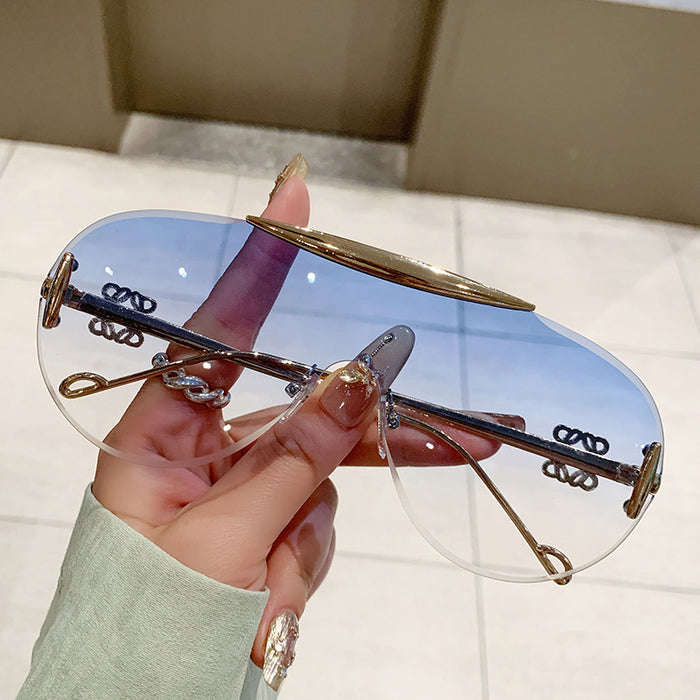 Wholesale Frameless sunglasses, personalized one-piece large frame, fashionable and high-end sunglasses