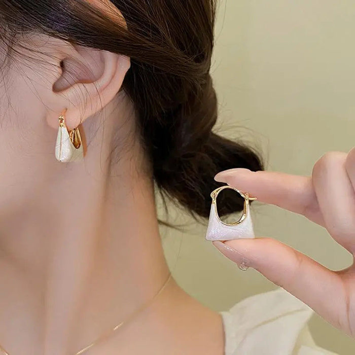 Wholesale Silver needle bag earrings, niche, light luxury design, high-end wholesale earrings