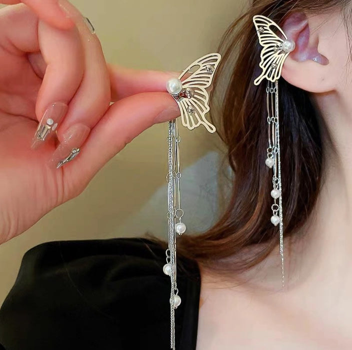 Wholesale Hollow out butterfly earrings, new trendy style, pearl tassel ear bone clip, high-end feeling, light luxury earrings