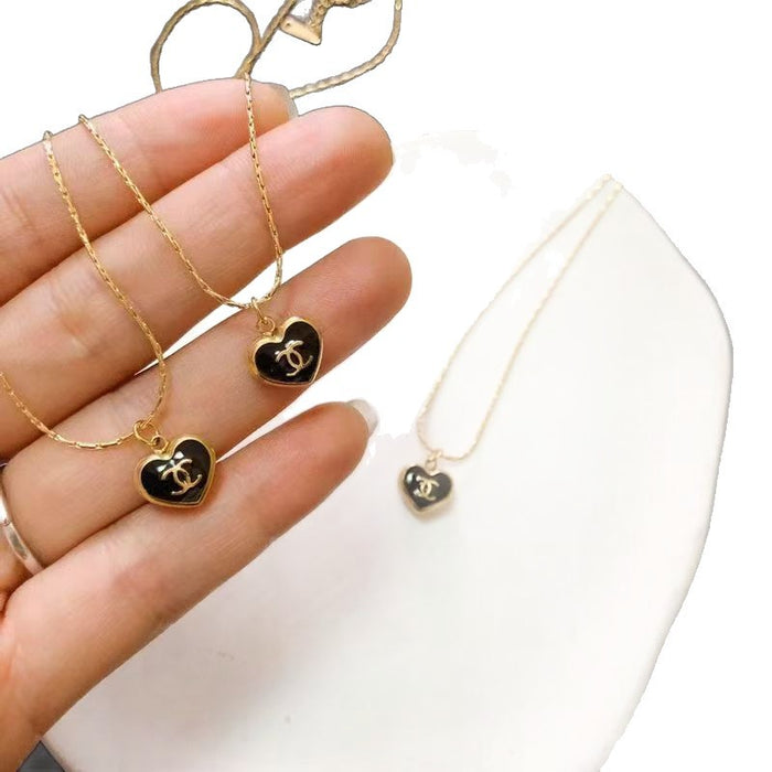 Wholesale Niche fashion versatile simple heart-shaped pendant