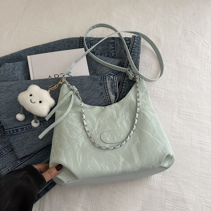 Wholesale Personalized commuting shoulder bag, fashionable large capacity tote bag, casual