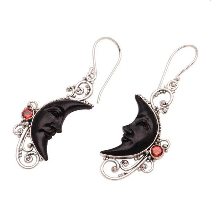 Wholesale hollow fashion carved gem black moon sun face earrings