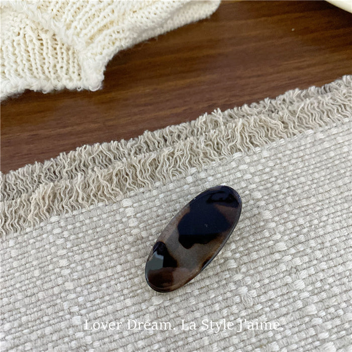 Wholesale Leopard print cross bow geometric hair clip, fashionable grip clip, versatile hair accessory