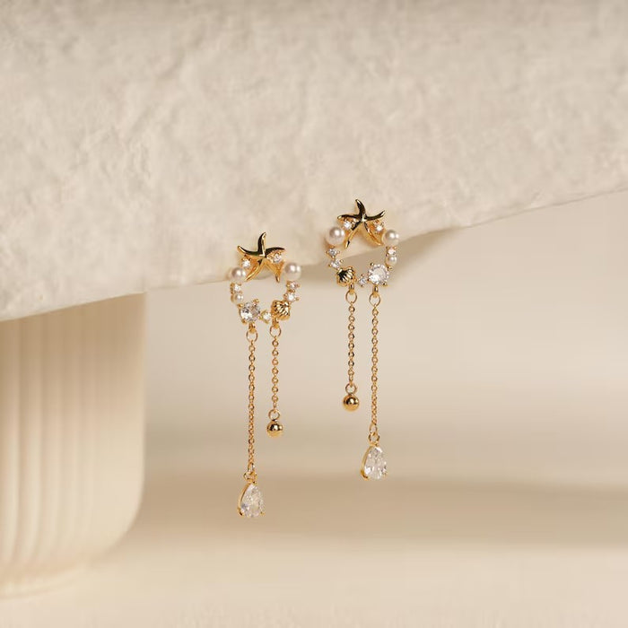 Wholesale Pure silver temperament, simple moon earrings, geometric asymmetry, long tassel pearl earrings