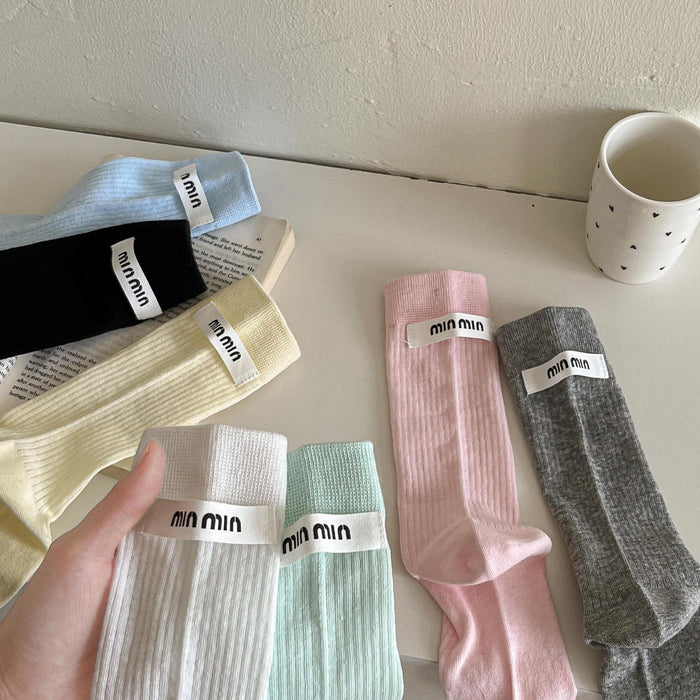Wholesale Medium length socks with solid color letters, fabric labels, stacked socks, thin cotton socks, sweat absorbing and breathable