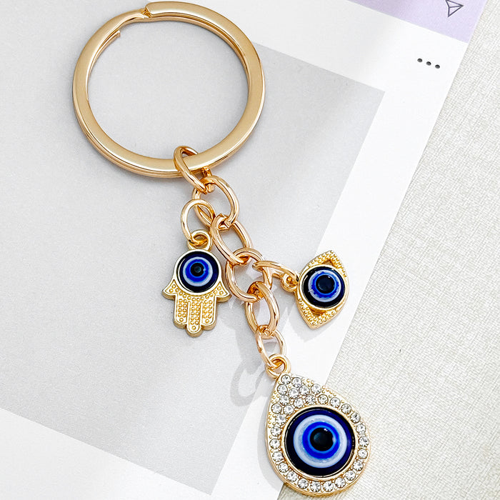 Wholesale Heart-Shaped Palm Water Drop Devil's Eye Pendant Keychain