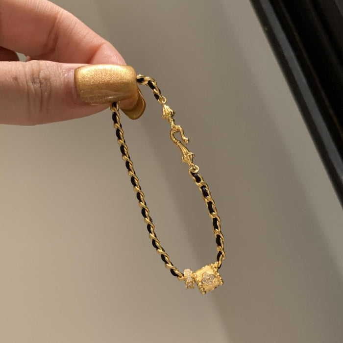 Wholesale Light luxury black gold woven bracelet, women's personality, versatile bracelet, unique and niche design, handmade accessory