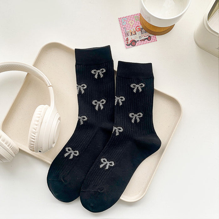 Wholesale Butterfly knot socks, children's mid tube socks, pile socks, boneless long tube socks, fashionable women's socks