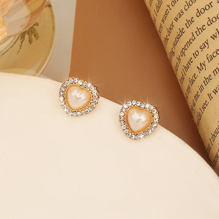 Wholesale Silver needle heart-shaped pearl earrings, light luxury earrings, retro temperament, niche design sense