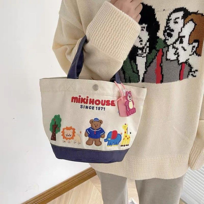 Wholesale canvas bag cartoon letter handbag mummy bag slip baby bag embroidered mother and baby bag