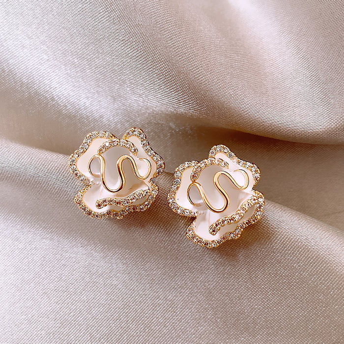 Wholesale Camellia earrings, pure silver needle earrings, niche design, high-end feel