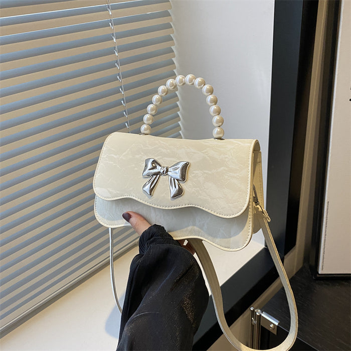 Wholesale Fashionable pearl handbag, crossbody, stylish design, butterfly texture small square bag