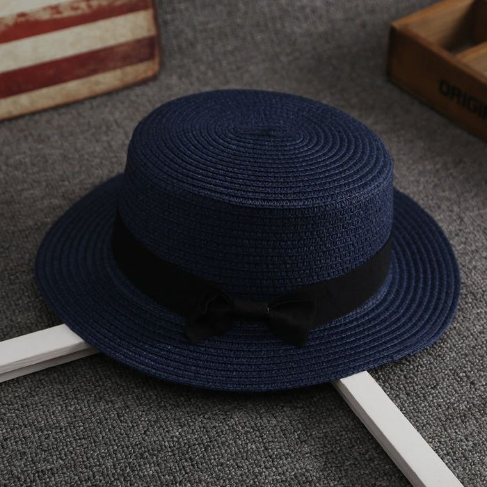 Wholesale New wide eave flat top straw hat for sun protection, vacation bow top hat for versatile sun protection