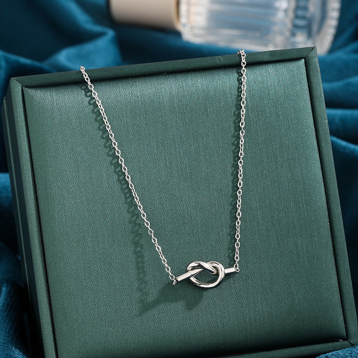 Wholesale Cross border new niche knot double heart winding pendant titanium steel O-shaped necklace simple and fashionable temperament exquisite