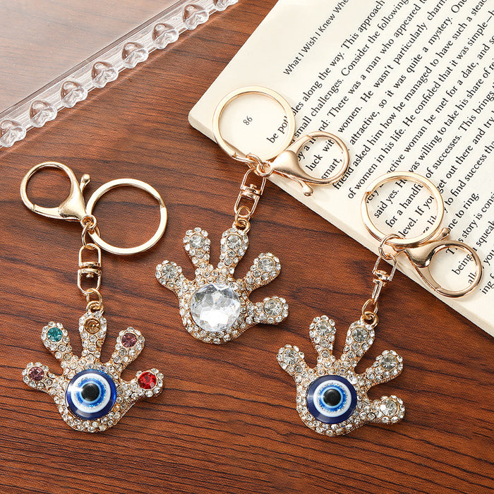 Wholesale Turkish Evil Eye Palm Keychain Zinc Alloy White Bag Charm Resale