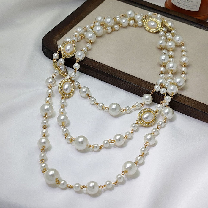Wholesale Exaggerated long pearl necklace with multiple layers of light luxury niche sweater chain