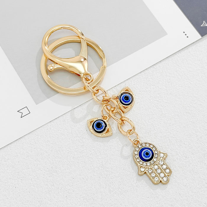 Wholesale Heart-Shaped Palm Water Drop Devil's Eye Pendant Keychain