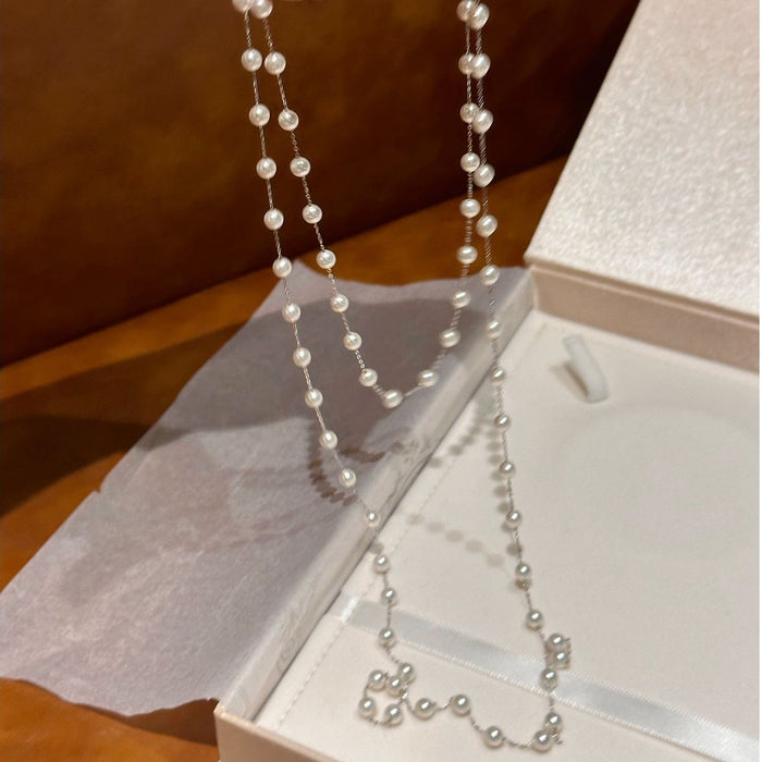 Wholesale Pearl double-layer layered necklace, exquisite and fashionable collarbone chain, elegant and luxurious sweater chain