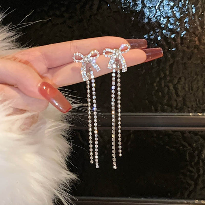 Wholesale Light luxury high-end sparkling bow tassel earrings, fashionable and elegant temperament, trendy earring wholesale