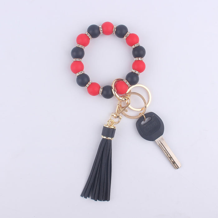 Wholesale Silicone bracelet wrist keychain tassel pendant