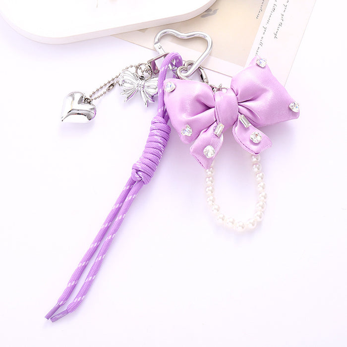Wholesale Leather bow heart pendant luggage keychain lanyard accessories single buckle tassel pendant accessories