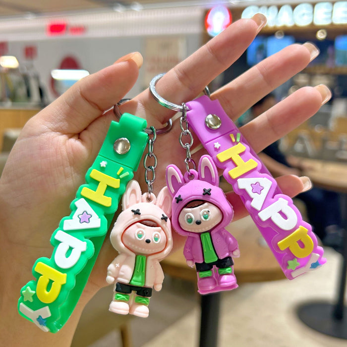 Wholesale Cute cartoon silicone keychain with cute little monster keychain for sweatshirt