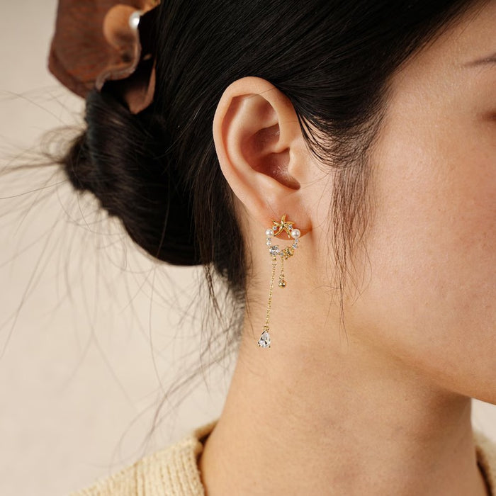 Wholesale Pure silver temperament, simple moon earrings, geometric asymmetry, long tassel pearl earrings