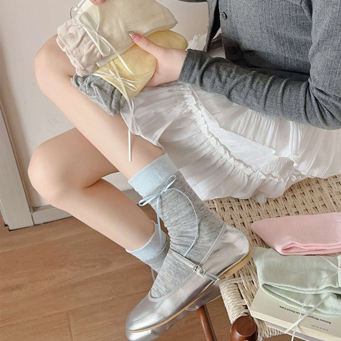 Wholesale Colorful bow tie pile socks, cute and versatile socks