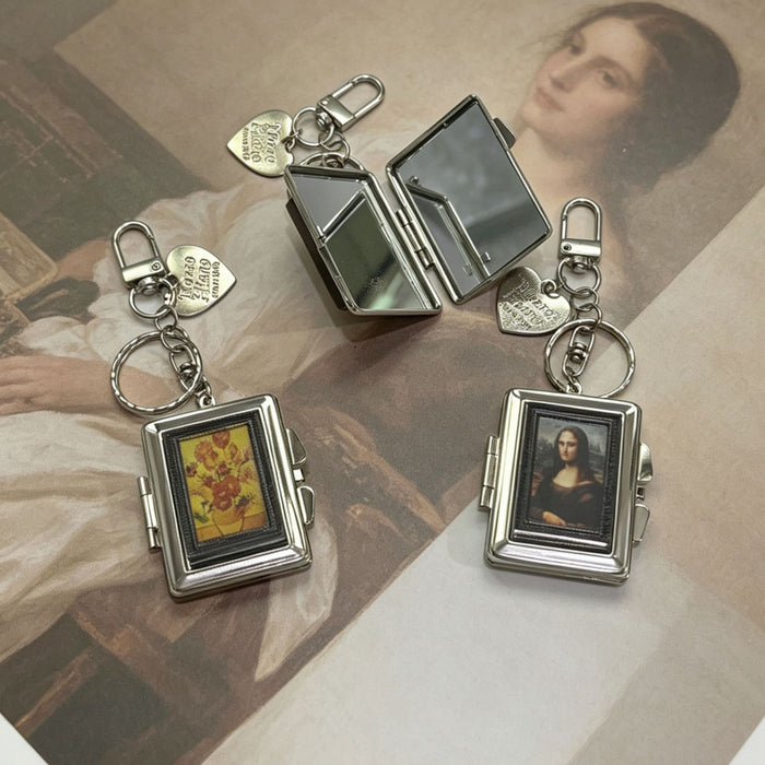 Wholesale Double-Sided Cosmetic Mirror Mona Pattern Bag Charm Keychain Zinc Alloy Boutique
