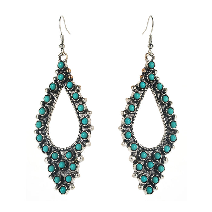 Wholesale Vintage cross-shaped openwork oval turquoise earrings