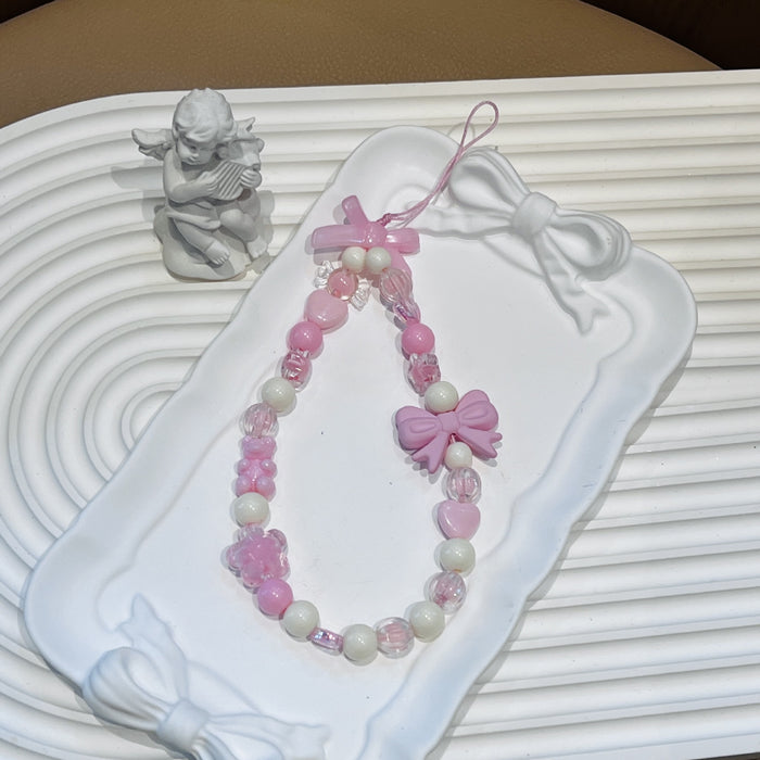 Wholesale ins mobile phone lanyard bowknot lanyard beaded anti-lost pendant