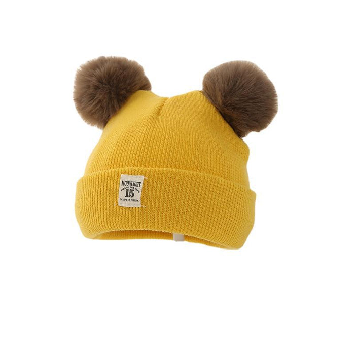 Wholesale Knitted hat with added yarn cap and fabric label