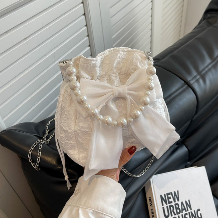 Wholesale Pearl bag, new fashionable bow chain bucket bag, niche and versatile crossbody bag
