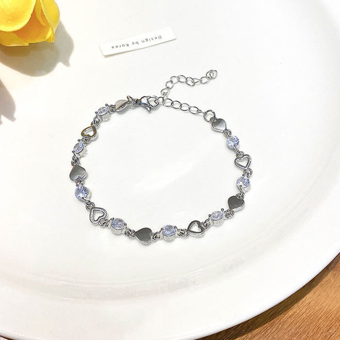 Wholesale Sweet and cool heart-shaped zircon bracelet with niche design, hollowed out heart-shaped bracelet, light luxury and versatile gift