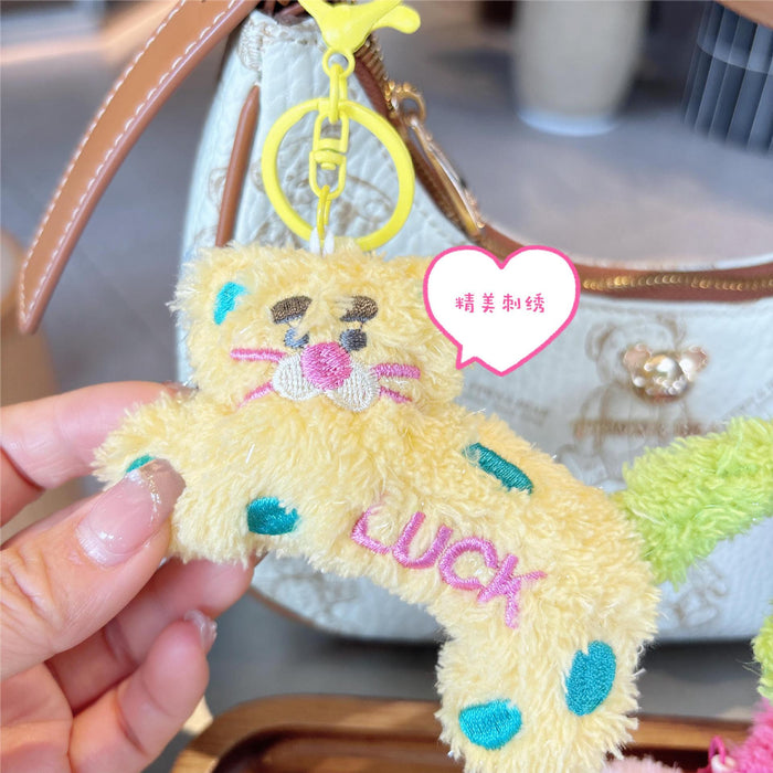 Wholesale Creative cartoon polka dot leopard doll keychain DIY twist tail decompression doll student pendant